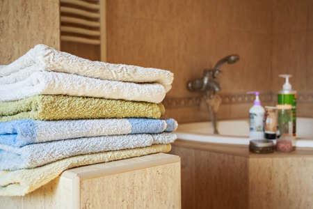 Colorful towels lie in the bathroomの写真素材