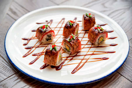 Traditional japanese sushi rolls in restaurantの写真素材