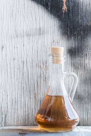Seed oil in decanter healthy food conceptの写真素材
