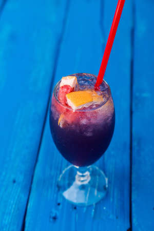 Dark restaurant cocktail with grapefruitの写真素材