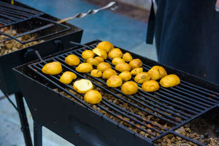 Close up potatoes cooked on grillの写真素材