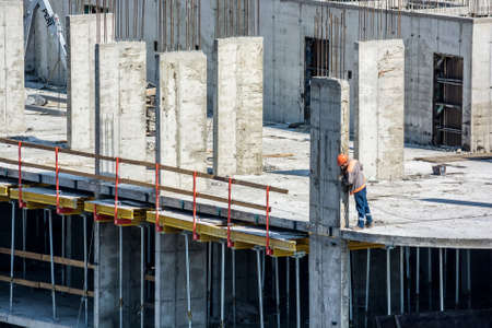 Workers at construction site of new buildingの写真素材