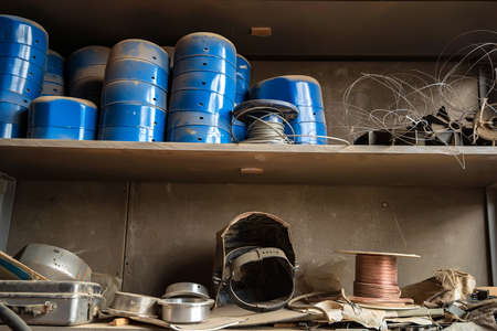 Close up shelves with equipment in joinery