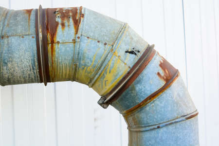 Old industrial pipe on plant