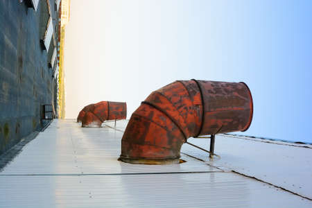 Old industrial pipes on plantの写真素材