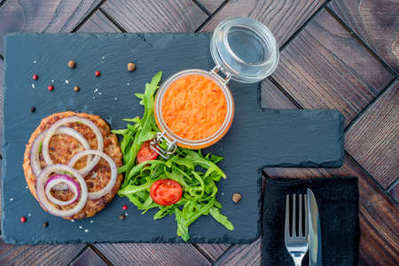 Grilled steak of chopped beef with vegetablesの写真素材