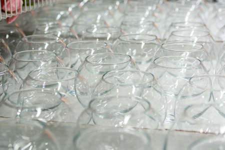 Close up empty wine glassess without leg in shopの写真素材