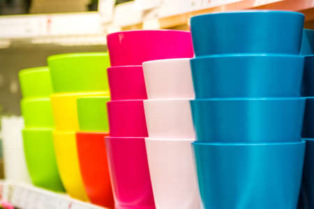 Colorful flowerpots in the florist storeの写真素材