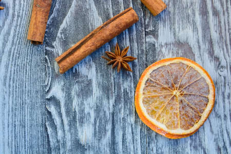 Christmas spices on wooden backgroundの写真素材