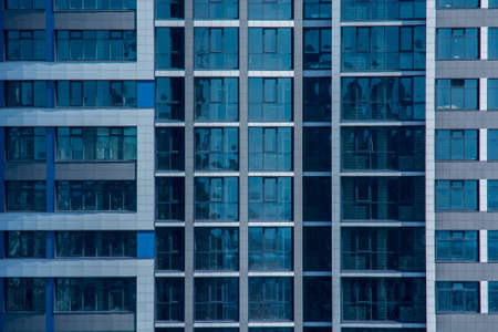 Close up office windows of modern skyscraper