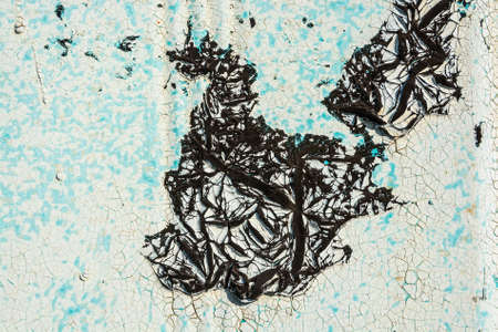 Close up white cracked paint on wallの写真素材