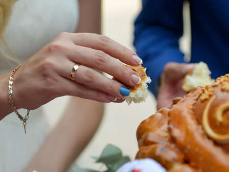 Tasting wedding breadの写真素材
