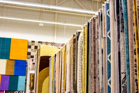 Many colorful carpets in the storeの写真素材