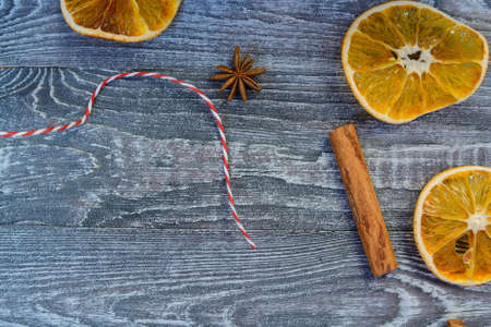 Christmas spices on wooden background