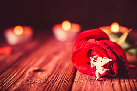 Valentines day background with rose, candles