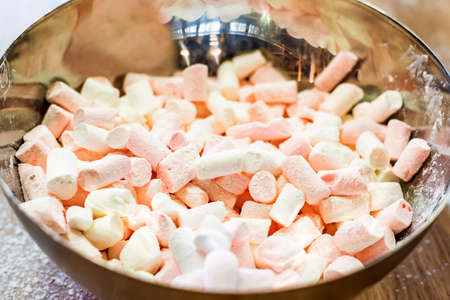Colorful marshmallows close up in a bowlの写真素材