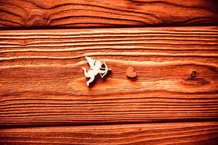 Wooden figures of hearts and cupid, Valentinesの写真素材