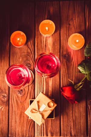 Valentines day background with rose,candles, ringの写真素材