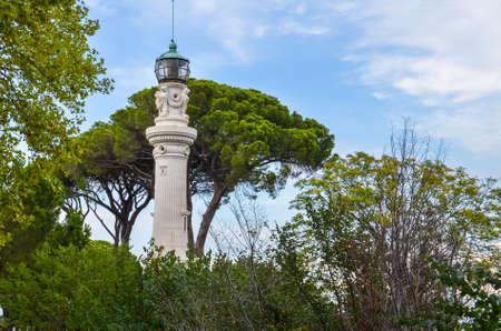 Small communications tower among trees in Romeの写真素材