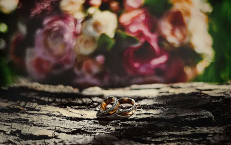 Wedding rings and brides bouquetの写真素材