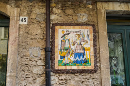 TAORMINA, ITALY - OCTOBER 2, 2017: Decorative Sicilian street tilesのeditorial素材