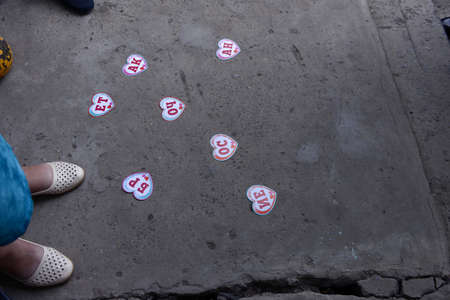 Groom solves wedding task on cardsの写真素材