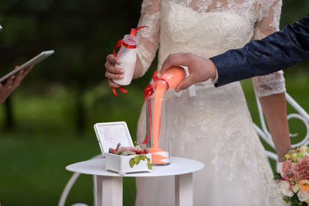 Mixing sand at wedding ceremonyの写真素材