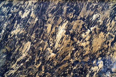 Abstract background of beige smears on darkの写真素材