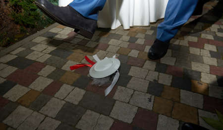 Breaking plates on wedding popular traditionの写真素材