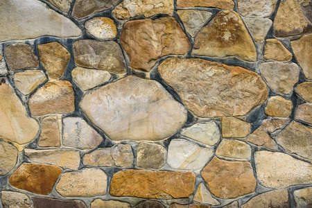 Close-up decorative beige stonewall texture