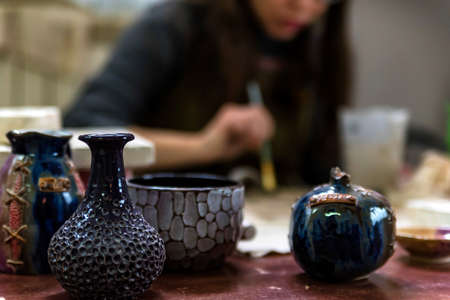 Beautiful ceramic vases at pottery workshopの写真素材