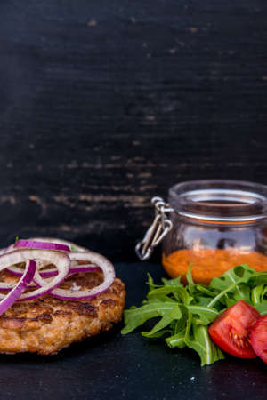 Grilled steak of chopped beef with vegetablesの写真素材