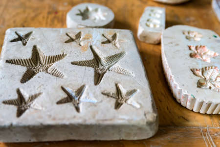 Clay imprints of starfishの写真素材