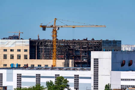 Modern construction site of building with crane