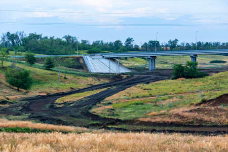 Modern road bridge in countryside in autumn
