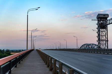 View of modern concrete bridge over riverの写真素材