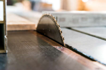 Circular saw cuts wood close up processの写真素材