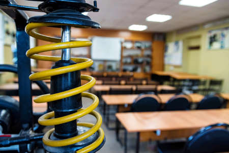 Scock absorber and spring of a car in driving schoolの写真素材