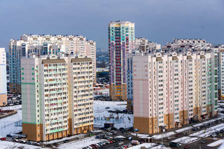 View of modern high-rise apartment buildings in winterの写真素材