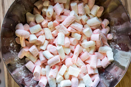 Colorful marshmallows close up in a bowlの写真素材