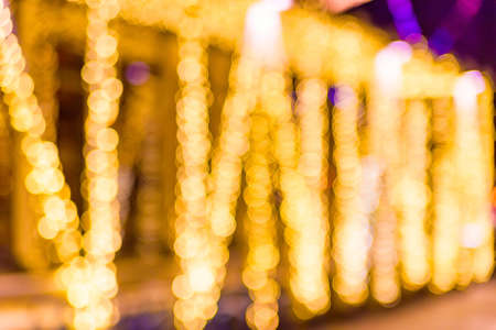 Blurred holiday Christmas and New Year lightsの写真素材