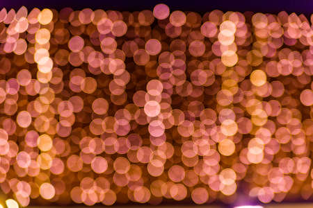 Blurred holiday Christmas and New Year lightsの写真素材