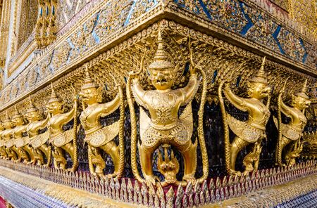 Statue Of Garudas Seized  Naka Decorated On The Wall Of Temple Of The Emerald Buddha,Grand Palace,Bangkok,Thailandの写真素材