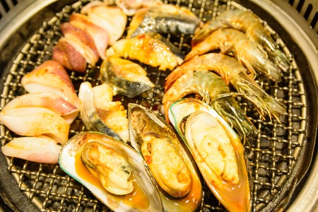 SEAFOOD ARE GRILLED ON THE GRILLの写真素材