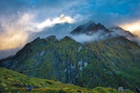 The Sacred Fishtail Mountian (Machhapuchre) seen in the distance, sunrise, in Annapurna Range, Nepalの写真素材