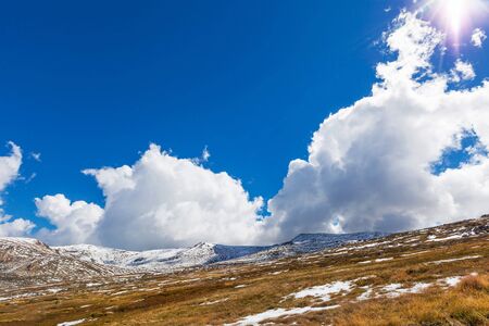 Beautiful white clouds and blue sky over Snowy Mountains, New South Wales, Australiaの写真素材