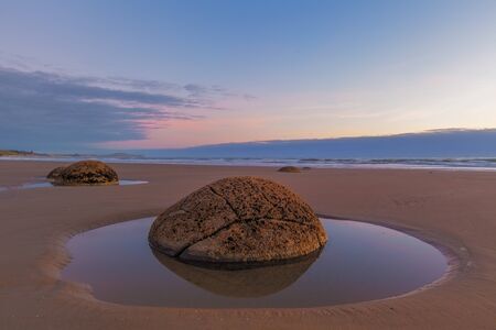 Moeraki Boulder closeup at sunrise, Koekohe beach,Otago, South Island, New Zealandの写真素材