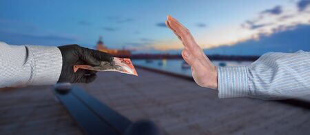 Refusing to accept suspicious Australian 20 dollarsの写真素材