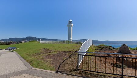 Kiama Lighthouse on a bright sunny summer day, Sydney, Australia.の写真素材