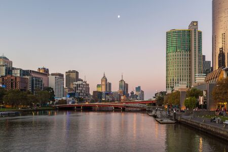Melbourne CBD - APR 17 2016: Cityscape at dusk with Kings Bridge over Yarra River.のeditorial素材